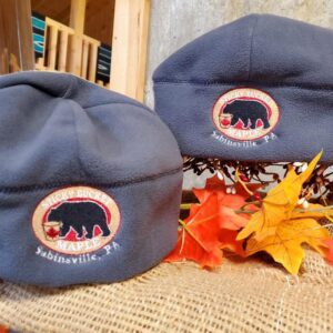 Two navy-blue beanie with Sticky Bucket Maple logos