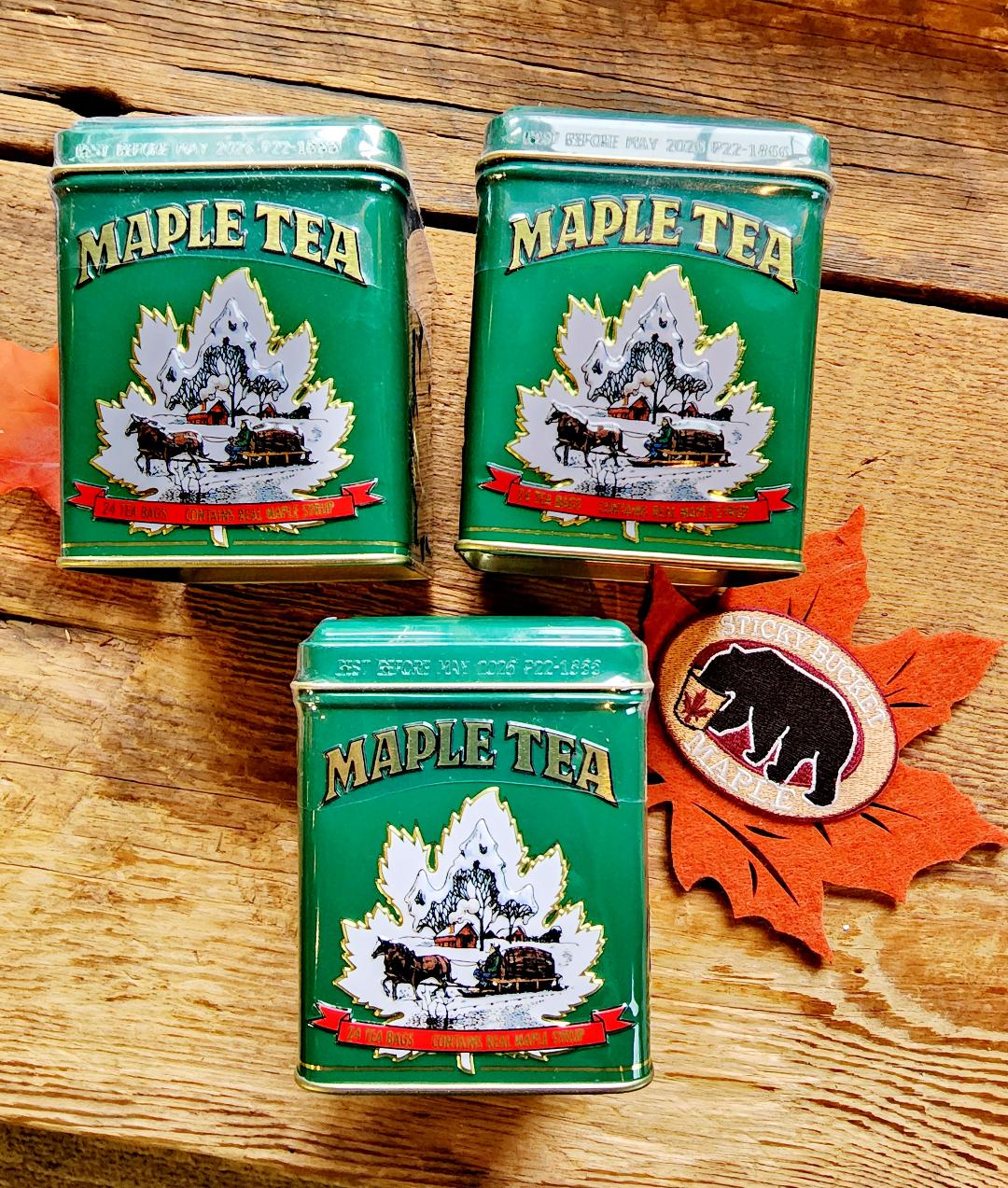 Pack of three maple green tea cans